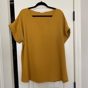 entro mustard colored top